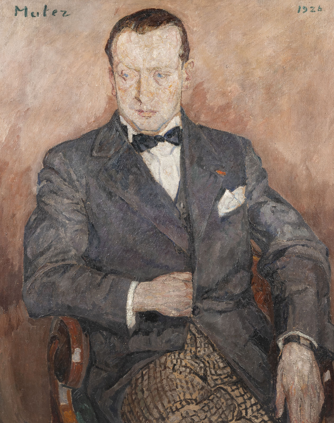 Portrait of an elegantly dressed man, painted by Matez in 1926. The man wears a dark gray suit with a black bow tie and a white shirt. He sits, his hands folded over a cane with a woven handle, which lies across his lap. His expression is serious, his eyes looking directly at the viewer.